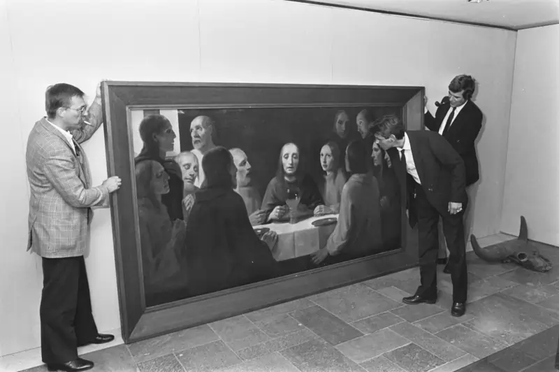 Two men holding a painting of The Last Supper I painted by Han van Meegeren